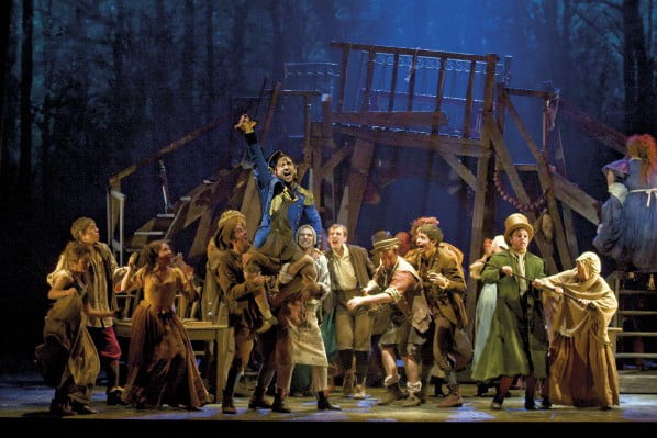 02 Ashley Artus as Thenardier and the company. Photo Credit Catherine Ashmore